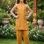 Mustard and golden printed cotton festive wear kurta set