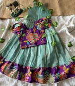 Kids skyblue salsa fabric gown with viscose crepe koti featuring hand-placed position embroidery work