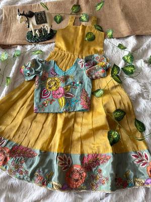 Kids yellow salsa fabric gown with viscose crepe koti featuring hand-placed position embroidery work 1