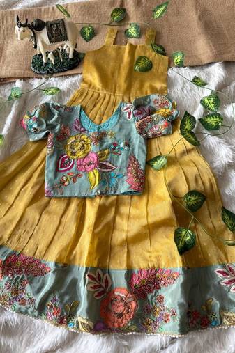 Kids yellow salsa fabric gown with viscose crepe koti featuring hand-placed position embroidery work