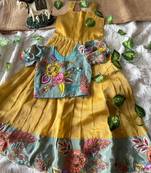 Kids yellow salsa fabric gown with viscose crepe koti featuring hand-placed position embroidery work