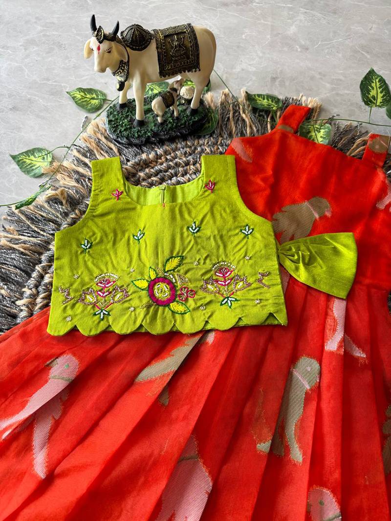 Kids red soft organza zari weaving gown with raw silk maggam embroidery work koti