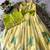 Kids yellow soft organza zari weaving gown with raw silk maggam embroidery work koti