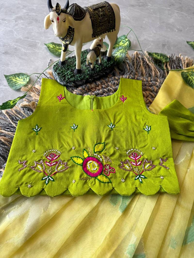 Kids yellow soft organza zari weaving gown with raw silk maggam embroidery work koti
