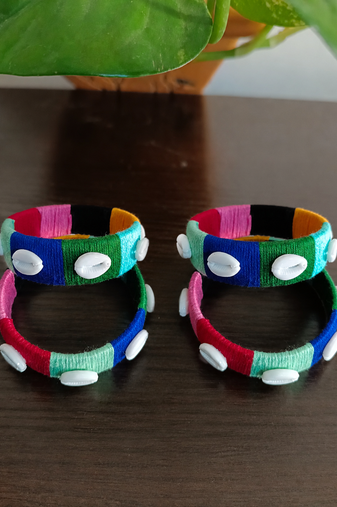  multicolour thread-wrapped cowrie shell bangle set