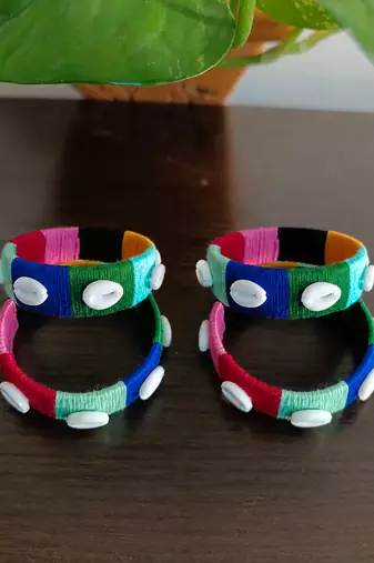  multicolour thread-wrapped cowrie shell bangle set