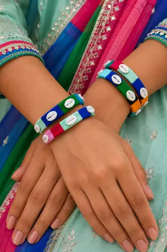  multicolour thread-wrapped cowrie shell bangle set