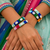  multicolour thread-wrapped cowrie shell bangle set