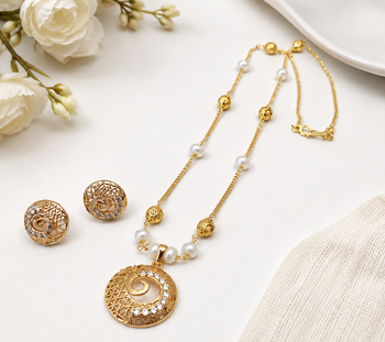 Gold-toned pearl & crystal spiral pendant necklace filigree spiral design, pearl beaded chain, crystal embellished. 2