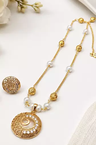Gold-toned pearl & crystal spiral pendant necklace filigree spiral design, pearl beaded chain, crystal embellished.