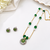 Green beaded pendant necklace floral meenakari pendant, gold-tone chain, stud earrings included, ethnic indian style
