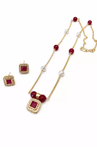 Gold-toned ruby red beaded pendant necklace and earrings set pearl accents, square cz pendant, festive wear, gold chain