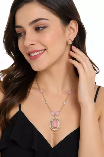 Pink stone pendant necklace and earrings jewellery set gold-tone chain, crystal embellished, pearl accents, rectangular.