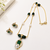 Green stone & pearl gold-tone pendant necklace and earrings set, floral pendant, oval bead chain, women's jewellery set