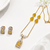 Yellow stone & pearl pendant necklace and earrings jewellery set gold-toned chain, crystal accents, beaded necklaces.