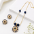 Blue crystal & pearl floral pendant necklace, stud earrings included, bead accents, sunflower design, women's jewellery