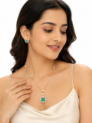 Emerald green cz pendant necklace and earrings jewellery set pearl beaded chain, star-shaped pendant, cz stone accents. 1