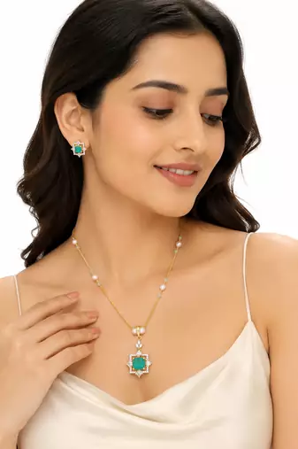 Emerald green cz pendant necklace and earrings jewellery set pearl beaded chain, star-shaped pendant, cz stone accents.