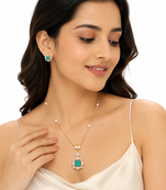 Emerald green cz pendant necklace and earrings jewellery set pearl beaded chain, star-shaped pendant, cz stone accents.