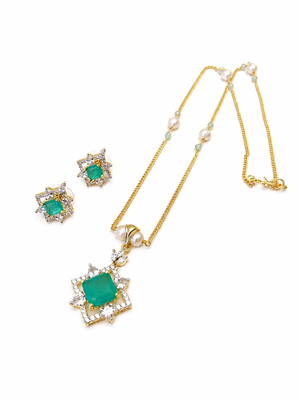 Emerald green cz pendant necklace and earrings jewellery set pearl beaded chain, star-shaped pendant, cz stone accents. 3