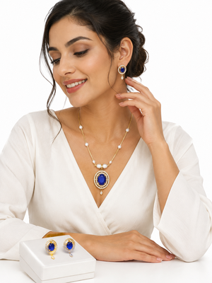 Blue oval stone pendant necklace and earrings jewellery set pearl chain, cz stone accents, festive wear. 1