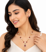 Red crystal & pearl pendant necklace and earrings jewellery set oval cz pendant, pearl beaded gold-tone finish.
