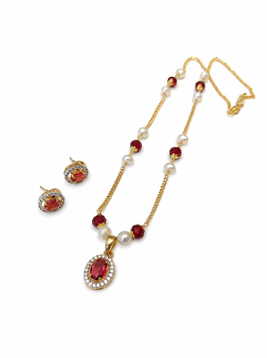 Red crystal & pearl pendant necklace and earrings jewellery set oval cz pendant, pearl beaded gold-tone finish. 3