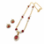 Red crystal & pearl pendant necklace and earrings jewellery set oval cz pendant, pearl beaded gold-tone finish.