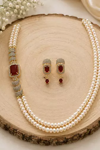 Double strand pearl necklace and earring set with ruby stone cz diamond accents, gold-tone finish, side brooch design