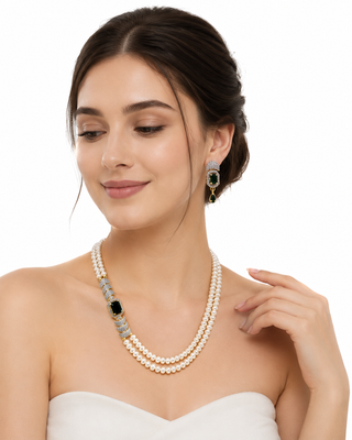 Pearl necklace & earring set with emerald green cz stone 2-layer strand, side brooch design, gold-tone bridal jewellery. 1
