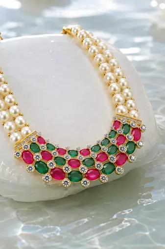 Pearl strand necklace set with ruby & emerald stones, gold-tone multi-strand pearls, cz accents, traditional design.