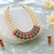 Pearl strand necklace set with ruby & emerald stones, gold-tone multi-strand pearls, cz accents, traditional design.