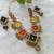  handcrafted multicolour fabric kundan & coin statement necklace set