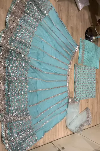skyblue mirror embroidered net lehenga choli with silk blouse set