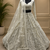 off white color embellished seed pearls Shimmering Sequins net Lehenga Choli set