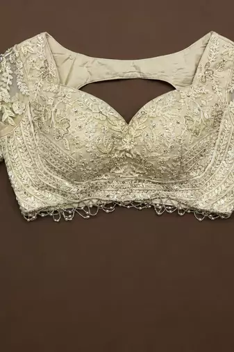 off white color embellished seed pearls Shimmering Sequins net Lehenga Choli set