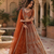 orange color Fancy Patten and Motif Crystal and Sequince work net Lehenga Choli set