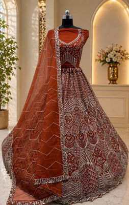 orange color Fancy Patten and Motif Crystal and Sequince work net Lehenga Choli set 2