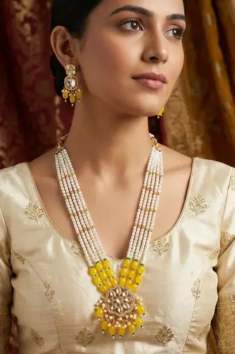 yellow beaded kundan necklace set