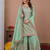 Sea green chinon silk sequence embriordered sharara suit