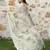 cream multicolor shimmer handloom cotton blend saree with floral border print