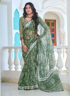 green cotton blend saree with floral print 1