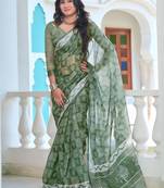 green cotton blend saree with floral print
