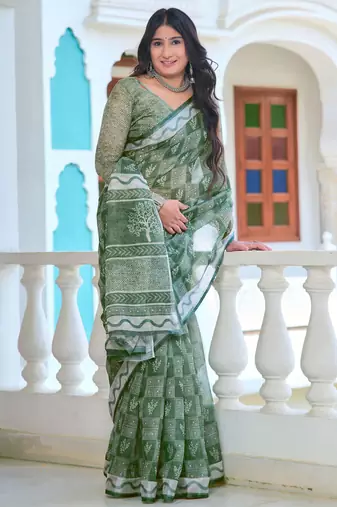 green cotton blend saree with floral print