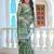 green cotton blend saree with floral print
