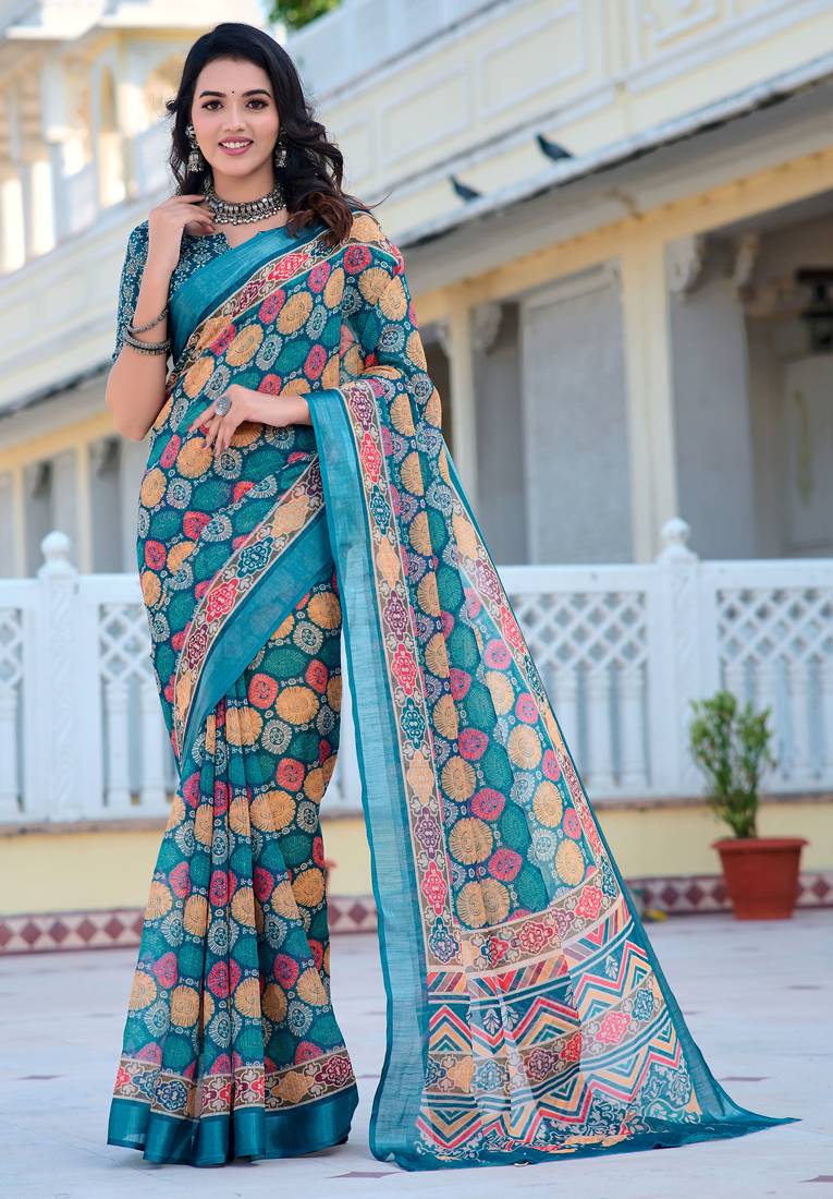 teal cotton blend saree with floral print