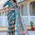 teal cotton blend saree with floral print