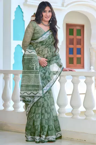 green cotton blend saree with floral print