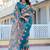 teal cotton blend saree with floral print