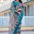 teal cotton blend saree with floral print